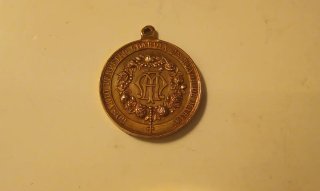 Medallón Vaticano y Medalla Virgen Rosario