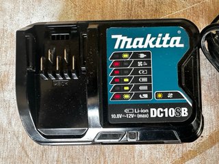 Taladro Makita HP330D con cargador y baterías