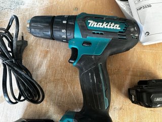 Taladro Makita HP330D con cargador y baterías