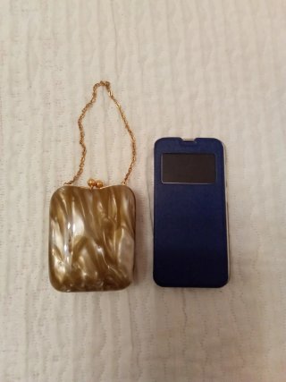 Bolso-monedero de nácar.