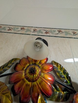 Specchio con fiori in ferro battuto
