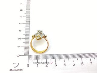 anillo oro 18k con piedra con diamante