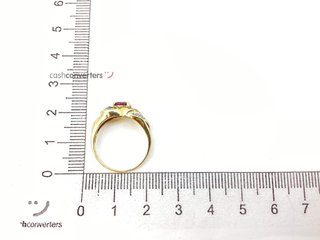 anillo oro 18k con piedra con diamante,rubi