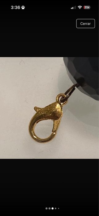 Colgante piedra negra facetada oro
