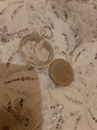 Medalla  recuerdo de mi Primera Comunión .Plata.