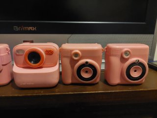 Cámara infantil rosa con impresora
