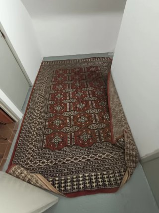 Alfombra de lana con diseño tradicional