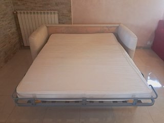 Divano letto beige in tessuto