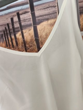 Top bianco spalline sottili
