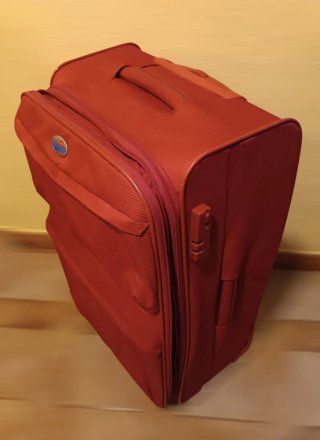 Maleta de viaje American Tourister roja 25kg