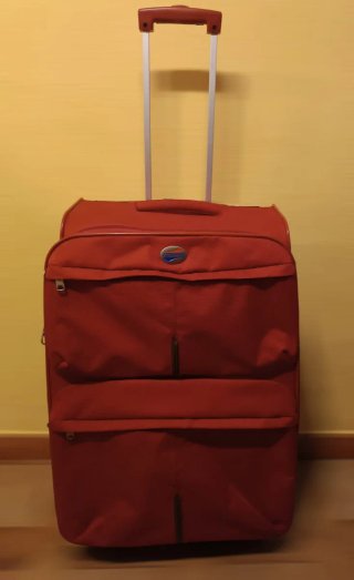 Maleta de viaje American Tourister roja 25kg