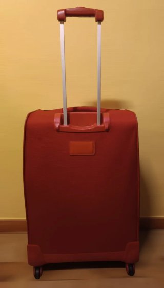 Maleta de viaje American Tourister roja 25kg