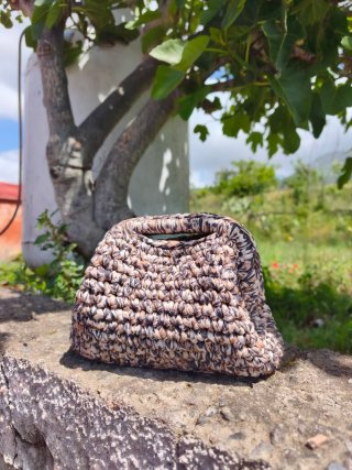 Clutch bag leopardata con chiusura 16cm.