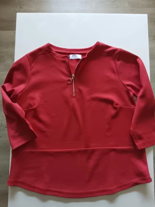 Jersey color coral con cremallera