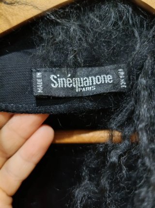 Abrigo fino negro con cuello de pelo