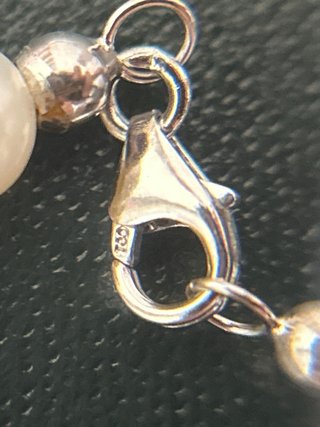 Collar de perlas y oro