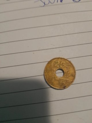 Moneda 25 Pesetas con agujero expo 92