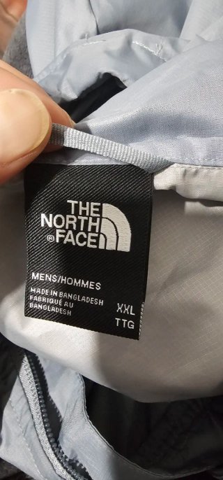 Cortavientos The North Face Gris Naranja