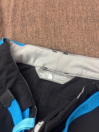 Pantaloni The North Face neri con cintura blu