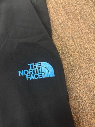Pantaloni The North Face neri con cintura blu