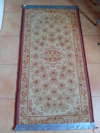 Alfombra vintage beige y roja