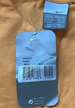Top Deportivo Nike color mandarina talla xs Nuevo