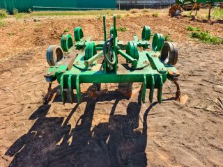 Arado extensible 9 brazos