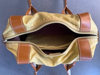 Bolso de mano y monedero Lancel amarillo