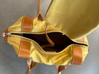 Bolso de mano y monedero Lancel amarillo