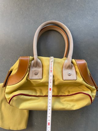 Bolso de mano y monedero Lancel amarillo