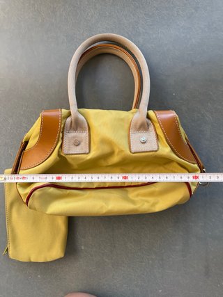 Bolso de mano y monedero Lancel amarillo