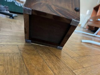 Paragüero de madera con diseño ovalado