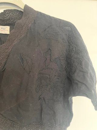 Bolerito negro talla única  Largo 35 cms