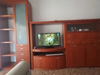 Mueble de comedor madera y cristal