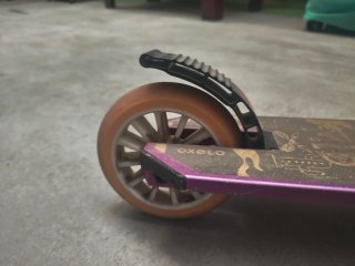 Patinete Oxelo morado y rosa