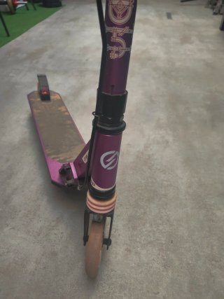 Patinete Oxelo morado y rosa