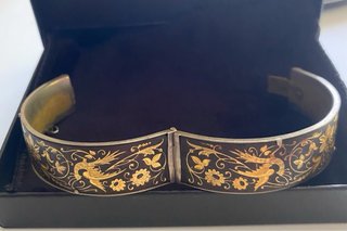 Bracciale rigido oro e nero