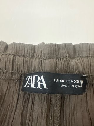 Pantalones de tela arrugada mujer