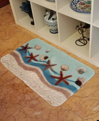 Tappeto da bagno con stelle marine e conchiglie