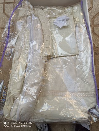 Colcha de cuna con chichoneras