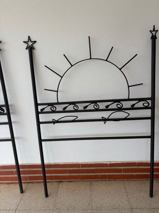 Cabecero de forja Sol y Peces
