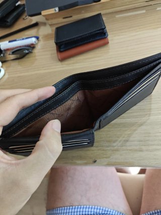 Cartera Emidio Tucci de cuero marrón