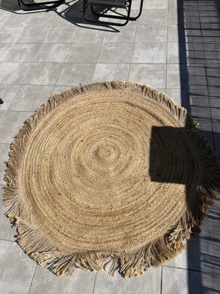Alfombra redonda de esparto con flecos