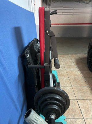 Banco de pesas plegable y mancuernas