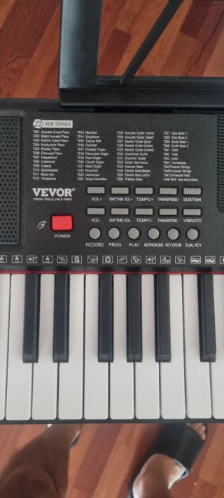 Piano electrónico con soporte y auriculares