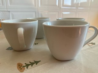 Juego de 4 tazas blancas de porcelana