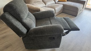 Sillón individual de tela gris