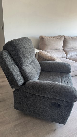 Sillón individual de tela gris