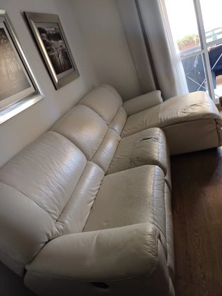 Sofá chaiselongue tela y piel