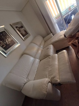 Sofá chaiselongue tela y piel